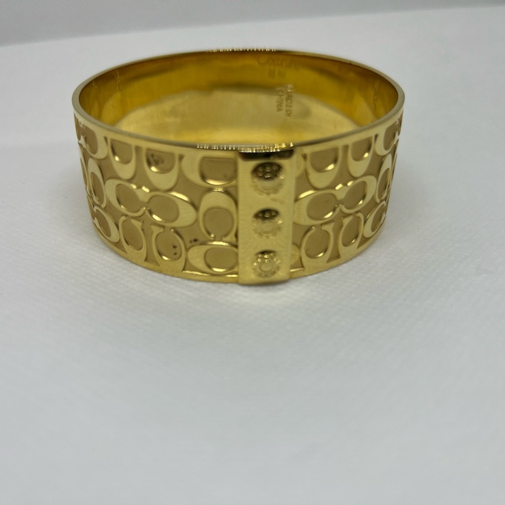 Coach gold wide bangle bracelet
